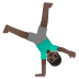 🤸🏿‍♂️ man cartwheeling: dark skin tone display on Google